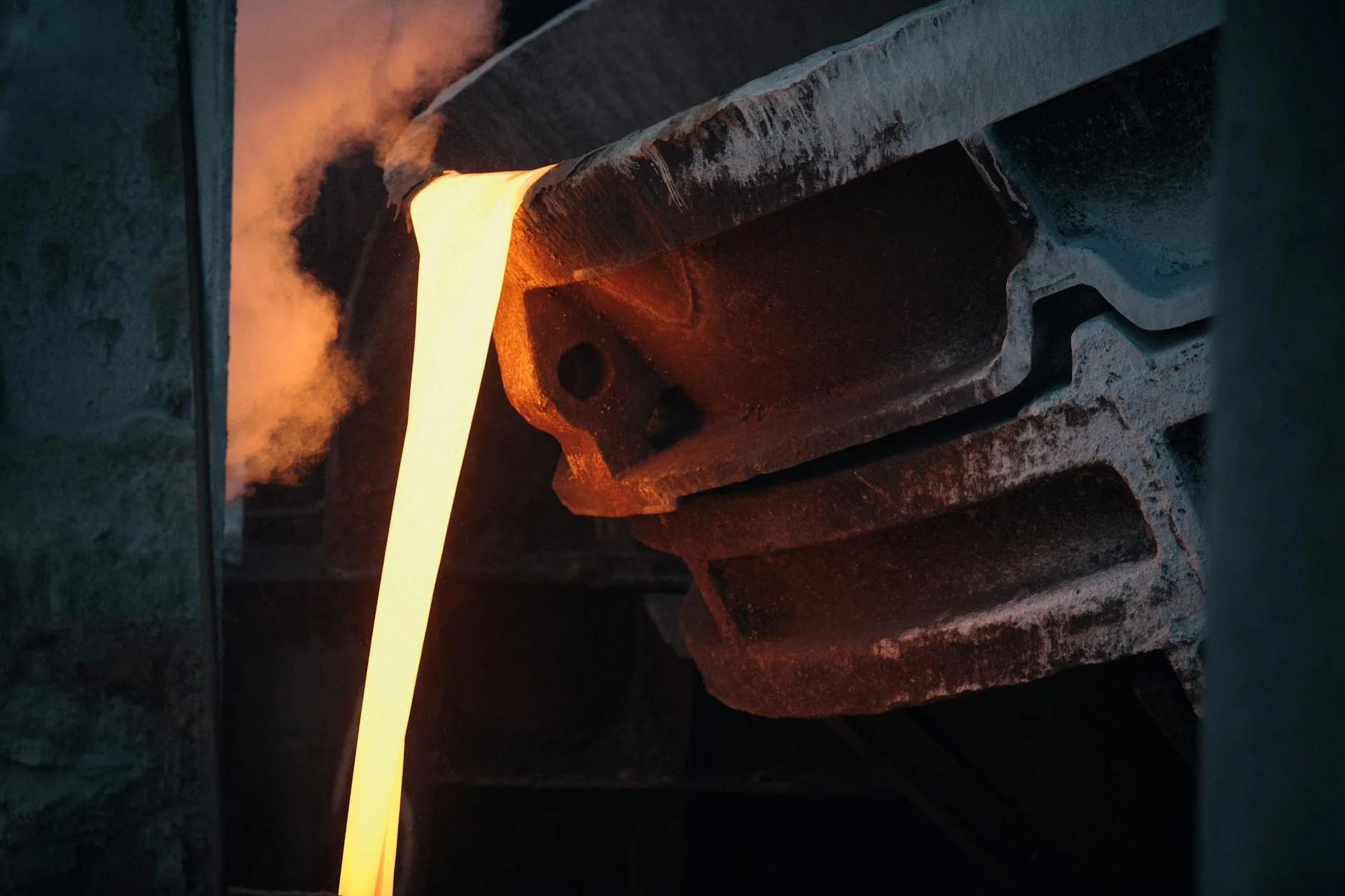 melted steel in a cast iron container